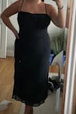 Love this dress! I love the slip/mesh look, it's really classy and can be worn for everything. I sized up to XL so it was a little looser and it fits perfectly. Could've squeezed into a L but love the loose fit of an XL! - COURTNEY C.