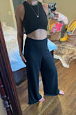 Feels like I'm wearing pj's out of the house and I love it! I bought in a S originally, which is my usual size, but exchanged it for a medium because I wanted them to be a tad looser and long. I have an athletic build with a booty so either could work but I liked that the M was a little looser on the waistband too. I also like my pants to almost touch the ground. Great quality fabric. - Eli M.