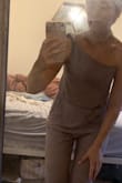 Wondering why mine came one shouldered? Thanks.. was hoping to wear this to work. - Kelly M.