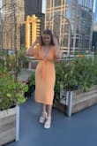 It turned out to be lower cut than I was expecting and needed to be ironed but lovely and classy overall! Cute and comfortable. The color is even better in person. - Morgan