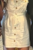 I am taller at 6 ft, so this dress was long enough to where I felt comfortable wearing it in public! Normally dresses are too short and I can't wear them. This one is definitely short but not too extreme. The belt holders broke fast but the dress is good quality and not see-through at all! I recommend. - Rachel Y.