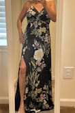 The material is beautiful, the print is beautiful. It fits true to size. But I just don't like how it looks on me. So I'm going to return it. It is not as dressy as I wanted for a black-tie wedding. So sadly I will probably return or exchange it for something else. - Lisa F.