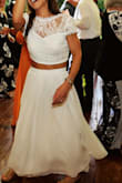 I was so pleased that this dress came in days after ordering it for my wedding. I didn't think I needed to try it on beforehand because I purchased 4 other dresses that fit perfectly. My only issue was that it was like 5 inches too long. I still loved the dress and had my friend's mother hemmed it for me to change into. - Kathryn W.