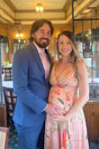 I initially purchased the shorter version (Remarkable Entrance) for my brother's wedding in Jan, but had to return it after I found out I was pregnant in Feb! This was the right call for a June wedding. Still the One is loose in the waist and gave me plenty of room to breathe in the dress with my bump! Customer service was happy to assist me in my situation as the initial dress had never been worn and still had tags. The wedding turned out lovely and the dress was perfect with the Bride's theme and color choice! The fit is true to size and very flattering (I'd imagine on all body types). I did have it altered for height since I'm 5'3 but this is an easy fix for a seamstress. - Brittany M.