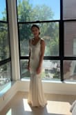 After trying on so many dresses which were great, I saw this one and knew it's the one I want. At first I was hesitant about the color but ordered it anyway. It needs to be steamed before trying it on. Steamed dress looks and fits completely different. Once I put it on it was perfect. I suggest purchasing several of the same kind since the fit might be slightly different. I bought 2 and one was a bit shorter so I kept that one and didn't need to adjust it. I loved the dress, the fit was perfect for me! So glad I could find it on Lulus. They have so many beautiful dresses to pick from for a perfect price. - Lena A.