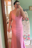 The material feels super nice. The 2 layers makes it so you dont really need to wear a bra. It is a little long on me but with heels its perfect! - IngMarie