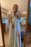 Bought this for a formal wedding in August when I will be 27 weeks pregnant. They didn't have my typical size large so I sized up to XL, thinking if anything it would give my baby bump extra room. I didn't really need the extra room as it is a little loose up top, but I'm glad I was able to get the dress because I'd been eyeing it for a while and waiting for my size!! It's very long and shorter people may have to have it hemmed (I won't need to because I'm wearing heels). I love the color, material, and fit of this dress. It seems like it could be worth double the price. So excited to wear it! - Elizabeth D.