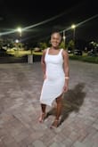 This dress hugs all of your curves! Very nice material. - Brittney S.