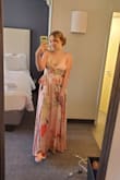 Absolutely loved this dress and I wore it to a summer formal wedding. It was true to size but was very long on me (even with heels). I am 5'4". I ended up getting the dress altered as it was simply too long to wear without tripping. The image is after alteration! - EmilyAnn D.