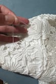 I ordered this dress for my bridal shower. The top was a little loose in the back and the button didn't hold very well. I had to have my fiancé pin the back of it together because If I leaned forward, the button would unhook and the dress fell forward. I resolved this dress but I thought it could have also been made better. The lacing on the seams doesn't match and those areas looked weird. I also had to cut a lot of loose strings off and also stitch some areas down because they looked out of place. - Jaclyn D.