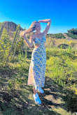 I've had this dress for years and wear it on many occasions and always get compliments on it. it fits true to size and is very flattering. - Hannah K.