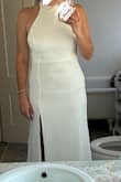I bought this dress for my wedding reception dress and was so excited but was completely let down for the quality. The top is lined more than the bottom half of the dress, which made the dress look like it was two different whites. The seam on the bottom half were like split? So they were very noticeable and overall poorly done. If the bottom half was lined as much as the top, i'm sure the dress would have been perfect. I even ordered the dress again to see if it was a one off but they were the same. The size was good and the length was great for my height, I tried it on with 3 1/2 inch heels and it was barely touching the ground. - Emily S.