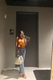 I loveeee this shirt! I'm so glad I bought it. It makes the outfit, not much more styling needed once you throw that top on. It's light material and flowy super comfortable and breathable. Worried about washing it and it getting ruined in the wash. - Emily E.