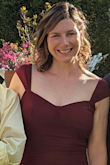 I purchased this dress to wear to an outdoor/evening wedding. At first I had ordered size Medium after looking at the size chart and the reviews, however, when I tried it on it was a little tight, especially in the hip area. I don't consider myself very "hippy", I would say average body type. Most dresses fit me in size 6, but this dress, though it is stretchy seemed a little too tight. I got a size large and that fit perfectly. I don't know if I'm the only one with this experience, but that was my one issue. Otherwise the material and the stretch was super comfortable! It was easy to dance in and comfortable to wear all afternoon/evening. The material and color are also very flattering. Once I got the size nailed down, I was very happy with this dress! - Kristen G.