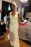 The dress fits well and skims the body, very flattering! - Mahasin C.