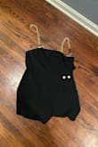 I bought this romper for a bachelorette party and the chain broke off while we were out that night (embarrassing). I could not repair the chain. For how much this romper was, I expected more uses out of it. Poorly made and I am very disappointed in the quality and regret purchasing. - Madeline M.