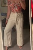 I wanted a pair of linen pants for a summer trip and these are very comfortable and cute! I love that the waist is fitted and has the belt to cinch. They are a little wrinkly which is pretty typical of linen. I usually get a medium in pants and dresses at Lulu's. Between putting these in my cart and checking out the last medium had sold out so I switched to a large. I'm actually very glad I switched because I don't think these would have fit nearly as well in a medium so maybe consider a size up if you're between two [sizes]! - Colleen M.