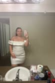 I was skeptical about purchasing this dress as on the model it looked very tiny and short. Having a big butt, my biggest issue with mini dresses is walking a few steps and having the dress ride up or not being able to fully cover my butt in general. I saw a review with a girl with similar measurements and it looked like it fit her really well so I decided to give it a try. I AM SO GLAD I DID. It doesn't ride up, covers my butt completely but still is a mini dress on me. Absolutely love this dress and highly recommend it if you're looking for a reception dress for your wedding! - Gabi M.