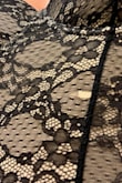 After waiting 3 weeks to go out to dinner, I wore this body suit one time and it fell apart and all the lace started frazzling and large holes ensued.  I wear minimal jewelry and definitely did not snag it on anything (I am 53). It is the quality of the item. I waited too long to wear unfortunately for a return. Spare yourself the money and DON'T BUY THIS ITEM. It is bad! These photos are of the garment not on me, but trust me the holes expand when it is on your body. I count 10 of them on the item. - KATYA K.