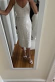 I am going to wear this dress for my wedding! I ordered an XS and it fit perfectly. No alterations are needed. I will say, some of the beads can be darker in some spots (giving an ombre look). Not sure it was a mistake - but don't think people will notice. I also found some shoes online that are going to go perfectly with it! - Krystine G.