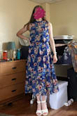 I ordered this dress for a potential wedding guest outfit because the pictures online and in the reviews look so pretty. What I didn't know is the top is loose-fitting sort of like a blouse. I have a very small bust so the proportions did not look good on me. I loved the color, pattern, and style but the top of the dress was sadly a deal breaker for me. - Naomi B.
