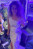 Wore this to the cocktail hour for our cruise wedding and it was perfection! A lot of reviews mention the high slit but I am on the shorter side (5'2") and it was not a problem at all. This dress would be perfect for any B&W party, cocktail party, or in a bride's wardrobe! - Francesca U.