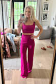 This set fits great! I ordered a size small, which is my usual size.  The small of my waist measures 26.5", but I typically buy high-rise size 25 jeans. I have an athletic build and I'm 5'3". The fabric is thick but soft, and the waistband pulls my waist in a bit, which I like. I don't have a bra on in this photo, but could totally get by with just pasties. - Emry B.