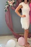 Super cute and I got a few compliments on it at my bridal shower! The only downside is that it's a little loose in the shoulder area, but I think the body portion would be too tight if I sized down. I'm a true XS, so get your true size. But if you're generally in between sizes, size down. - Alexis D.