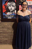 This dress is so beautiful. It was very flattering and I felt so lovely in it. As other reviews have said, the straps feel a bit snug compared to the rest of the dress, both with the sleeves up and off-shoulder. My range of motion was limited, but as I just needed to be able to sit, it didn't affect me too much. - Allison I.
