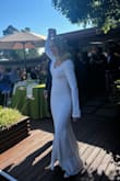 I ordered this for my wedding dress, it was so elegant and comfortable! I did have it hemmed and altered a bit so it fit me and only me. I also added some buttons and slits to the sleeves and a bustle. Regardless I got SO many compliments on it and no one could believe it was from Lulus! Could not recommend it more. - Sophia D.