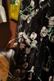 It's definitely true to size. Love the floral embroidery on the dress, but I do not like some of the embroidery sticking out from the dress makes it look cheap. The sleeves are a little too tight for my liking. Overall, it's quite a cute-looking dress. I can't wait to wear it out for a wedding! - Angelie P.