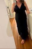 I love this dress and it's very flattering. I sear a 38DDD and this fit very well on my bust which is always the problem and you can wear a bra without it showing. Definitely hid my stomach which I love too. Perfect for a wedding! Looks black in the photo but it's a true navy! - Samantha M.