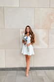 I got so many compliments on this dress. It fits perfectly and I even wore black shorts underneath and it wasn't see-through at all. So glad I purchased it! - Shelby P.
