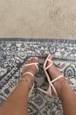 I have wide feet  and it fits so well. Strap on the back doesnt slip off. Perfect height and comfortable. Has some weight to it.  

This will be my new go-to shoes as it matches almost anything I wear. - Jessel R.