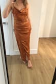 The dress fit really great and I loved the color on me but the wrap was so weird that the slit ended below the knee. Overall, it made me feel like a mummy. It was super cute otherwise. - Isabella P.