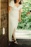 Very forgiving stretch with such a cute and unique toga/soiree/summer bride vibe. Shockingly worked well with no bra which is something I didn't imagine when I bought it. - El H.