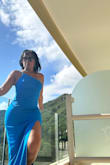 I am 5'9", 150 lbs. I ordered a Medium and it for perfectly. And it was long enough! 
The material has some give to it, so if you're worried that it'll be too tight&.don't!  I wore it for a wedding in Puerto Vallarta, MX. it was a hot day, the light material was a plus. - Valerie D.