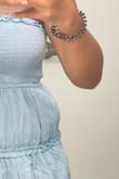 I was super excited for this dress to be a staple summer item in my wardrobe but to my dismay, the fit was soo off and unflattering! It wasn't as flowy as it shows in the model and it kept bunching up above my hips. I'm size xs/s and do not have wide hips at all but it made it look like I did. So sad it didn't work out. - Maria C.