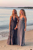 Purchased for a photo shoot. Returned the size small as it was just too big all over. XS worked much better. Soft cotton drapes beautifully. Decent twirl. Highly recommend! - Natalie B.