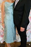 I wore this to a retirement party requesting formal attire. The fit, material, and comfort of the dress were great. Love the open back, and because I'm not top heavy, no bra needed. The side slit was not too revealing, as some previous reviews commented. - Mixee V.