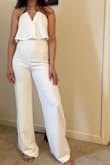 I really wanted to love this jumpsuit. I really hope they start making short sizes for these jumpsuits, they are LONG. I'm 5'5" and even with 4-inch heels they were too long on me. Also because the waist area is so plain, I felt like it made my tummy area look big. Sadly, I returned it. - Niharika K.