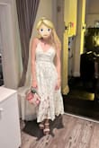 I'm so in love with this dress and it fits really well. The material is very resistant! I got a lot of compliments! - Tamires M.
