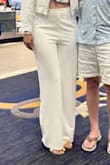 The material is so perfect. The pants are covering and not transparent! Very long and a great white color. Long enough for a 6-foot woman! - Tamires M.