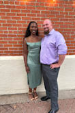 I received tons of compliments on this dress. The material is thinner than you'd expect but was perfect for a Midwest summer wedding. Runs large if you don't have much in the tummy or bust area. I am wearing a medium, but I had the chest and waistline area altered to my measurements. - Dannell S.