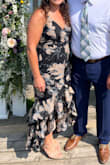 This dress was great! I loved the hemline and the flow it created. The size recommended by the size guide was right on. My hips run larger than my chest but this dress fit great. I was able to adjust the straps to fit my liking. I got a lot of compliments! - Jodi P.