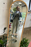 I love this romper! I wear it so frequently. It's a staple piece and so perfect for almost every season! It does wrinkle easily because of the type of fabric, but that doesn't bother me! - Kristin C.