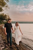 I'm a photographer and I chose this dress for my husband and I's 10th wedding anniversary photoshoot. It fits perfectly and had lots of flowy movement. It's a little long but manageable. It does come down on the chest quite a bit and needed to be taped on the shoulders but I would absolutely recommend it! It photographs beautifully. - Emily B.