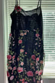 This dress looks really cheap in person. The dress is lined but the material is thin making the whole dress pretty see-through in sunlight. The straps are the same material as the lining and don't seem really well constructed. Wouldn't waste your money on this. I returned it. - Nicole F.
