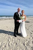 I bought this for my beach wedding in May and it was perfect. Very elegant and comfortable. The beading gave this dress an extra special touch. Size medium fits almost perfectly out of the box, but I did get it taken in at the waist a little bit. - Amy H.