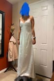 This is a very unique dress and I LOVED the pearls on the straps. It just unfortunately doesn't look flattering with my body type. I am 130 lbs and would probably size down - Nicole A.